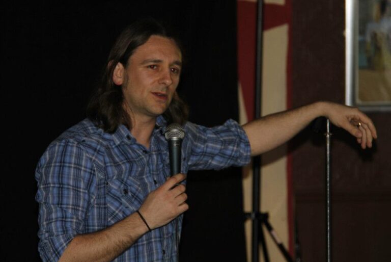 Actor, Writer and Comedian Lou Chawner performing Stand Up Comedy